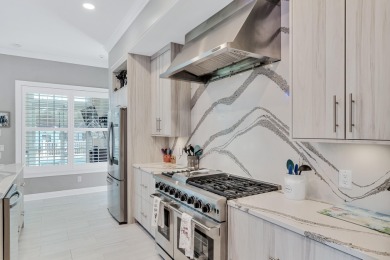 Tucked behind the private gates of the Bay Point community, this on Bay Point Resort Golf Club in Florida - for sale on GolfHomes.com, golf home, golf lot
