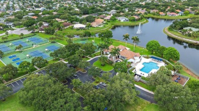 Nestled in a cul-de-sac in the sought-after community of Egret on The Golf Club of Jupiter in Florida - for sale on GolfHomes.com, golf home, golf lot