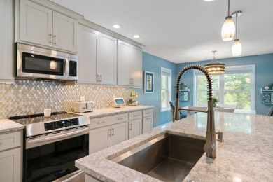 Meticulously maintained and beautifully updated, this stunning on Indian River Golf Club in Michigan - for sale on GolfHomes.com, golf home, golf lot