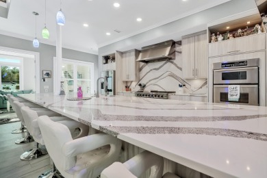 Tucked behind the private gates of the Bay Point community, this on Bay Point Resort Golf Club in Florida - for sale on GolfHomes.com, golf home, golf lot