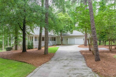 This 4600 square foot home sits on the 5th hole of the Preserve on Reynolds Lake Oconee - The Oconee in Georgia - for sale on GolfHomes.com, golf home, golf lot