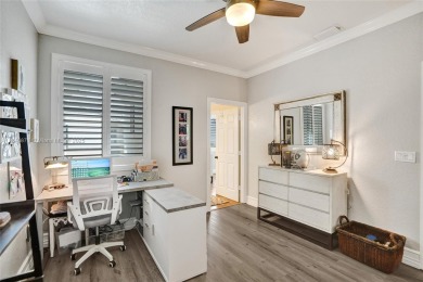 Live in the charming, historic Parrot Cove neighborhood of Lake on Lake Worth Municipal Golf Course in Florida - for sale on GolfHomes.com, golf home, golf lot