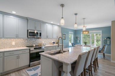 Meticulously maintained and beautifully updated, this stunning on Indian River Golf Club in Michigan - for sale on GolfHomes.com, golf home, golf lot