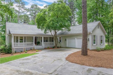 This 4600 square foot home sits on the 5th hole of the Preserve on Reynolds Lake Oconee - The Oconee in Georgia - for sale on GolfHomes.com, golf home, golf lot