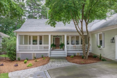 This 4600 square foot home sits on the 5th hole of the Preserve on Reynolds Lake Oconee - The Oconee in Georgia - for sale on GolfHomes.com, golf home, golf lot