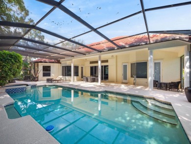 Welcome to 8212 Kiawah Trace, an exquisite custom-built on PGA Golf Club in PGA Village in Florida - for sale on GolfHomes.com, golf home, golf lot