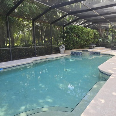 Welcome to 8212 Kiawah Trace, an exquisite custom-built on PGA Golf Club in PGA Village in Florida - for sale on GolfHomes.com, golf home, golf lot