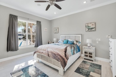 Tucked behind the private gates of the Bay Point community, this on Bay Point Resort Golf Club in Florida - for sale on GolfHomes.com, golf home, golf lot