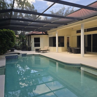 Welcome to 8212 Kiawah Trace, an exquisite custom-built on PGA Golf Club in PGA Village in Florida - for sale on GolfHomes.com, golf home, golf lot
