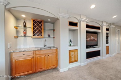 Tucked away on a private cul-de-sac in the gated subdivision of on Baytree National Golf Links in Florida - for sale on GolfHomes.com, golf home, golf lot