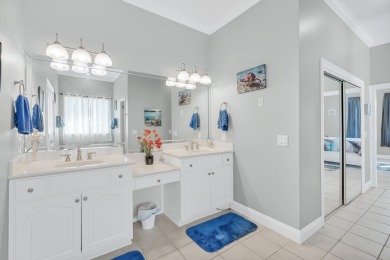 Tucked behind the private gates of the Bay Point community, this on Bay Point Resort Golf Club in Florida - for sale on GolfHomes.com, golf home, golf lot