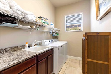 Welcome to this exceptional preserve-view pool home in the gated on River Wilderness Golf and Country Club in Florida - for sale on GolfHomes.com, golf home, golf lot