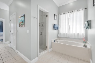 Tucked behind the private gates of the Bay Point community, this on Bay Point Resort Golf Club in Florida - for sale on GolfHomes.com, golf home, golf lot