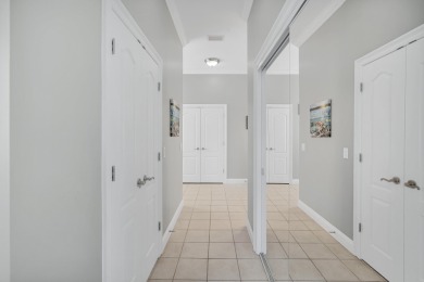 Tucked behind the private gates of the Bay Point community, this on Bay Point Resort Golf Club in Florida - for sale on GolfHomes.com, golf home, golf lot