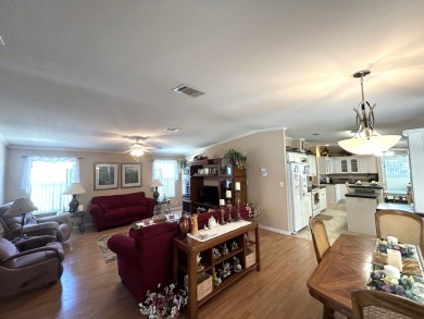 This home is located within a 55+ resort style leased land on Big Cypress Golf and Country Club in Florida - for sale on GolfHomes.com, golf home, golf lot