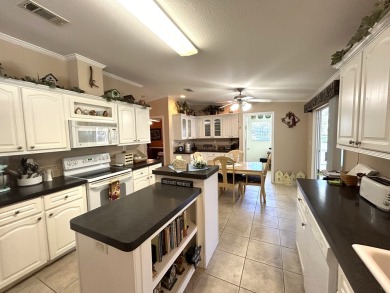 This home is located within a 55+ resort style leased land on Big Cypress Golf and Country Club in Florida - for sale on GolfHomes.com, golf home, golf lot