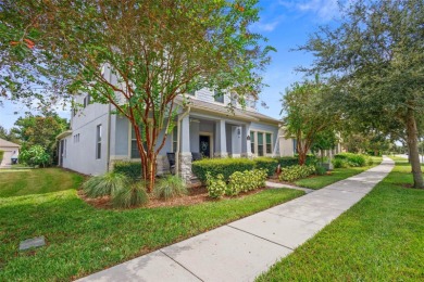 Welcome home to your stunning front porch LAKE VIEWS, on this on Orange County National Golf Center and Lodge in Florida - for sale on GolfHomes.com, golf home, golf lot