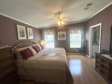 This home is located within a 55+ resort style leased land on Big Cypress Golf and Country Club in Florida - for sale on GolfHomes.com, golf home, golf lot