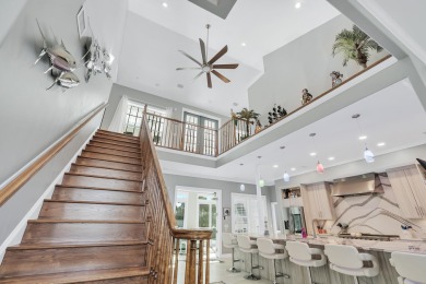 Tucked behind the private gates of the Bay Point community, this on Bay Point Resort Golf Club in Florida - for sale on GolfHomes.com, golf home, golf lot