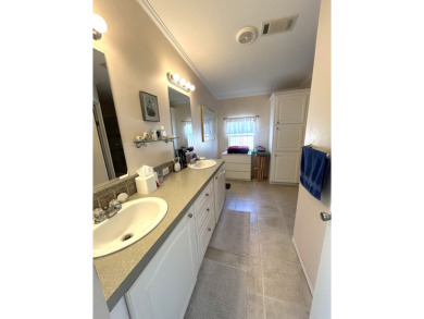 This home is located within a 55+ resort style leased land on Big Cypress Golf and Country Club in Florida - for sale on GolfHomes.com, golf home, golf lot