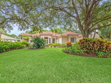 Welcome to 8212 Kiawah Trace, an exquisite custom-built on PGA Golf Club in PGA Village in Florida - for sale on GolfHomes.com, golf home, golf lot