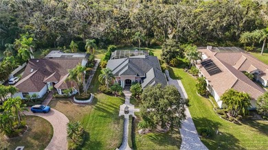 Welcome to this exceptional preserve-view pool home in the gated on River Wilderness Golf and Country Club in Florida - for sale on GolfHomes.com, golf home, golf lot