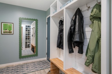 Meticulously maintained and beautifully updated, this stunning on Indian River Golf Club in Michigan - for sale on GolfHomes.com, golf home, golf lot