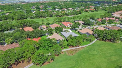 Welcome to 8212 Kiawah Trace, an exquisite custom-built on PGA Golf Club in PGA Village in Florida - for sale on GolfHomes.com, golf home, golf lot
