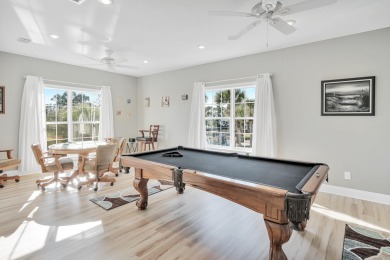 Tucked behind the private gates of the Bay Point community, this on Bay Point Resort Golf Club in Florida - for sale on GolfHomes.com, golf home, golf lot