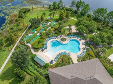 Welcome home to your stunning front porch LAKE VIEWS, on this on Orange County National Golf Center and Lodge in Florida - for sale on GolfHomes.com, golf home, golf lot