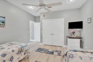 Tucked behind the private gates of the Bay Point community, this on Bay Point Resort Golf Club in Florida - for sale on GolfHomes.com, golf home, golf lot