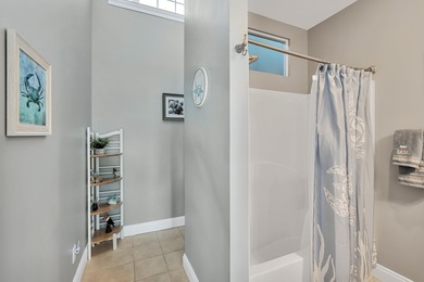 Tucked behind the private gates of the Bay Point community, this on Bay Point Resort Golf Club in Florida - for sale on GolfHomes.com, golf home, golf lot