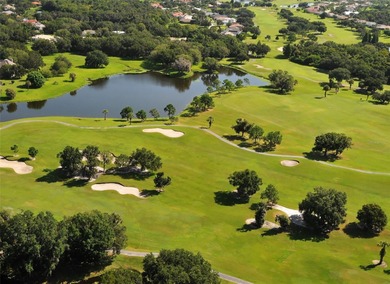 Welcome to this exceptional preserve-view pool home in the gated on River Wilderness Golf and Country Club in Florida - for sale on GolfHomes.com, golf home, golf lot
