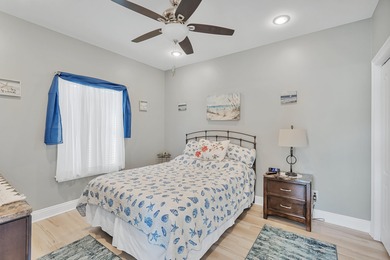 Tucked behind the private gates of the Bay Point community, this on Bay Point Resort Golf Club in Florida - for sale on GolfHomes.com, golf home, golf lot