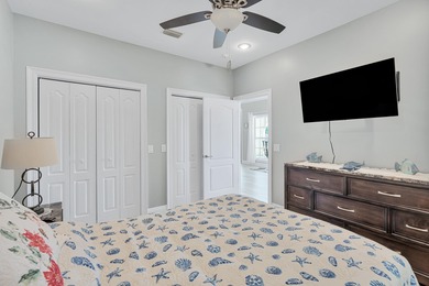 Tucked behind the private gates of the Bay Point community, this on Bay Point Resort Golf Club in Florida - for sale on GolfHomes.com, golf home, golf lot