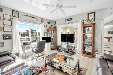 Tucked behind the private gates of the Bay Point community, this on Bay Point Resort Golf Club in Florida - for sale on GolfHomes.com, golf home, golf lot