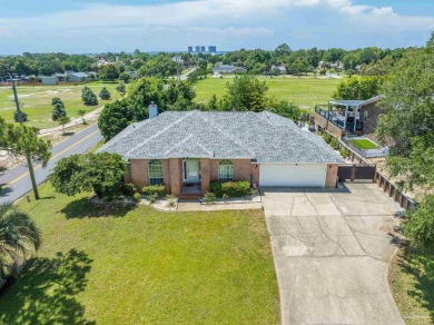 You'll enjoy the best of Florida living in this lovely 4 bedroom on Tiger Point Golf and Country Club in Florida - for sale on GolfHomes.com, golf home, golf lot