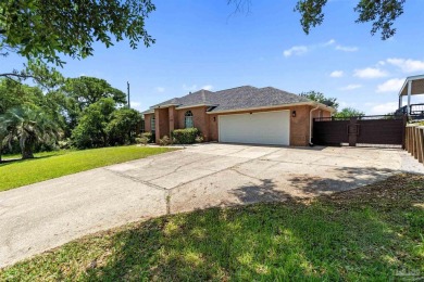 You'll enjoy the best of Florida living in this lovely 4 bedroom on Tiger Point Golf and Country Club in Florida - for sale on GolfHomes.com, golf home, golf lot