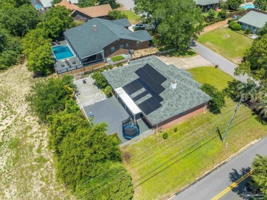 You'll enjoy the best of Florida living in this lovely 4 bedroom on Tiger Point Golf and Country Club in Florida - for sale on GolfHomes.com, golf home, golf lot