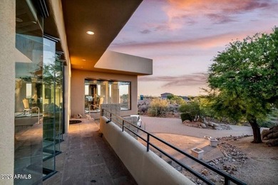 The Belgard pavers of the circular driveway lead up to this on Troon North Golf Club  in Arizona - for sale on GolfHomes.com, golf home, golf lot