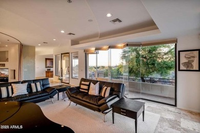 The Belgard pavers of the circular driveway lead up to this on Troon North Golf Club  in Arizona - for sale on GolfHomes.com, golf home, golf lot