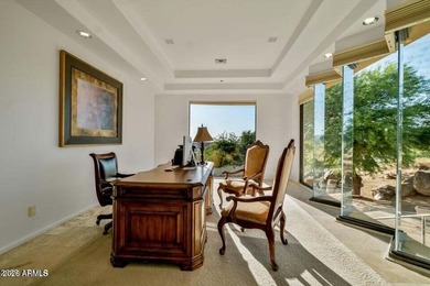 The Belgard pavers of the circular driveway lead up to this on Troon North Golf Club  in Arizona - for sale on GolfHomes.com, golf home, golf lot