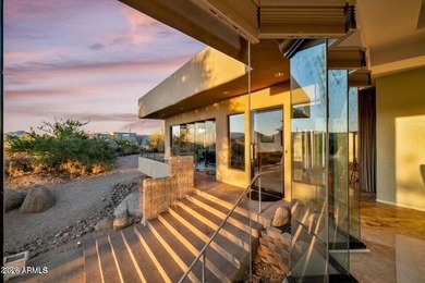 The Belgard pavers of the circular driveway lead up to this on Troon North Golf Club  in Arizona - for sale on GolfHomes.com, golf home, golf lot