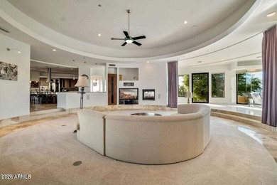 The Belgard pavers of the circular driveway lead up to this on Troon North Golf Club  in Arizona - for sale on GolfHomes.com, golf home, golf lot