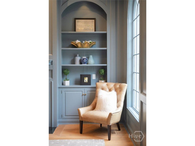 Midpoint Masterpiece - where mornings begin on the porch and on The Landings Club - Palmetto in Georgia - for sale on GolfHomes.com, golf home, golf lot