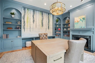 Midpoint Masterpiece - where mornings begin on the porch and on The Landings Club - Palmetto in Georgia - for sale on GolfHomes.com, golf home, golf lot