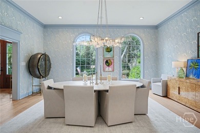 Midpoint Masterpiece - where mornings begin on the porch and on The Landings Club - Palmetto in Georgia - for sale on GolfHomes.com, golf home, golf lot