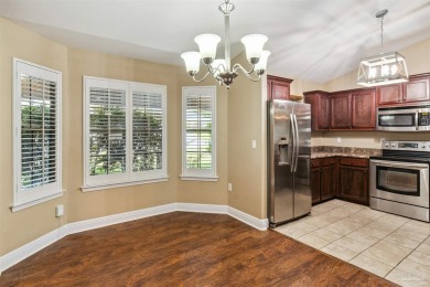 You'll blend with nature in this all brick, 3-bedroom, 2-bath on The Club At Hidden Creek in Florida - for sale on GolfHomes.com, golf home, golf lot