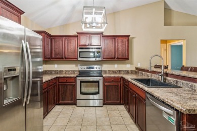 You'll blend with nature in this all brick, 3-bedroom, 2-bath on The Club At Hidden Creek in Florida - for sale on GolfHomes.com, golf home, golf lot