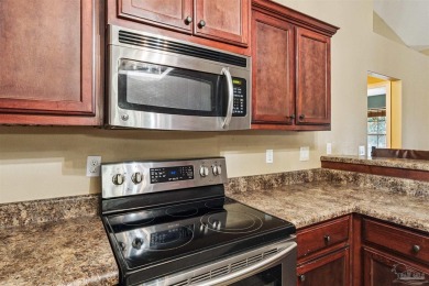 You'll blend with nature in this all brick, 3-bedroom, 2-bath on The Club At Hidden Creek in Florida - for sale on GolfHomes.com, golf home, golf lot